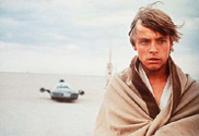 Luke has seen his aunt and uncle's death, but at least he has the comfort of his poncho.