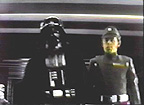 Vader and Commander Bast walking the hallway. Still from the Star Wars Holiday Special.