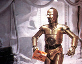 Satisfied, Threepio rushes to join his friends. From the Star Wars Insider, issue #29.