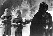 Vader and troops looking around the remains of Echo Base.