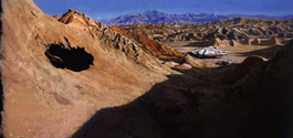 A matte painting of the Falcon and an X-Wing parked below, with what looks like a cave up in the ridge.  Image courtesy of T-Bone Fender.