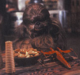 Lumpy steals a Wookiee-ookie while Malla isn't looking.